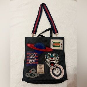 Gucci supreme night courier tote